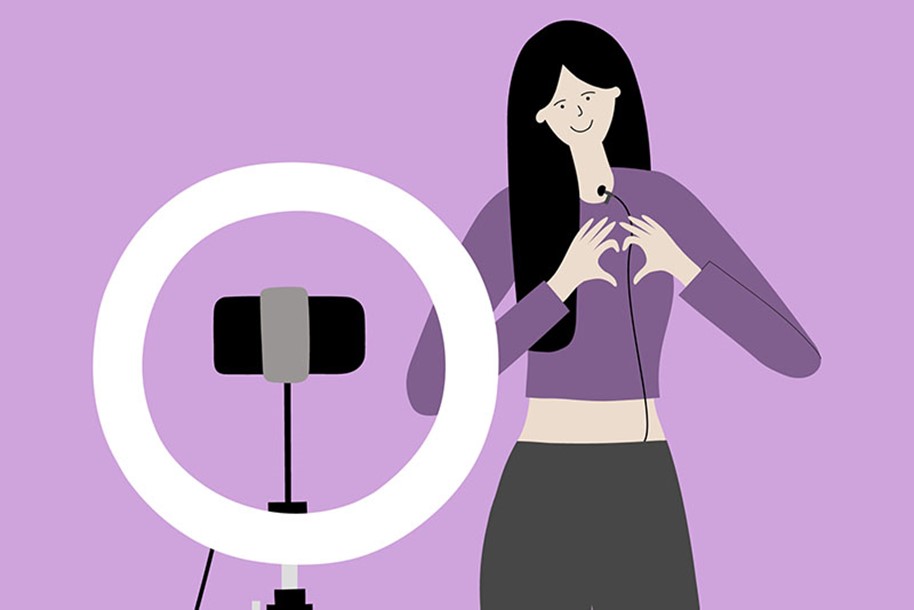 desenho de uma menina posicionada em frente ao celular preso em um ring light fazendo um coração com as mãos